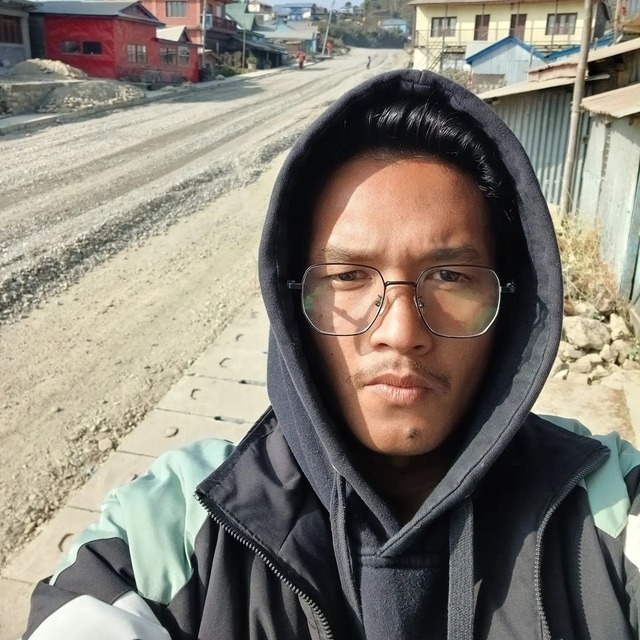 Portrait of Pukar Magar, Hi-Link Computer customer in Dharan